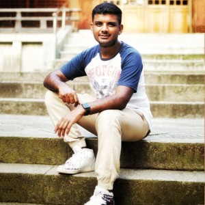 Hiten Bawa sitting on steps of a building